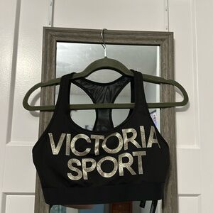 Victorias Sport black and gold sports bra size large!